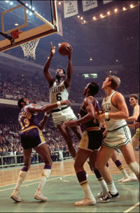 BOSTON - 1969:  Bill Russell #6 of the Boston Celtics goes up for a shot against Wilt Chamberlain #13 of the Los Angeles Lakers during a game played in 1969 at the Boston Garden in Boston, Massachusetts. NOTE TO USER: User expressly acknowledges and agrees that, by downloading and or using this photograph, User is consenting to the terms and conditions of the Getty Images License Agreement. Mandatory Copyright Notice: Copyright 1969 NBAE (Photo by Dick Raphael/NBAE via Getty Images)
